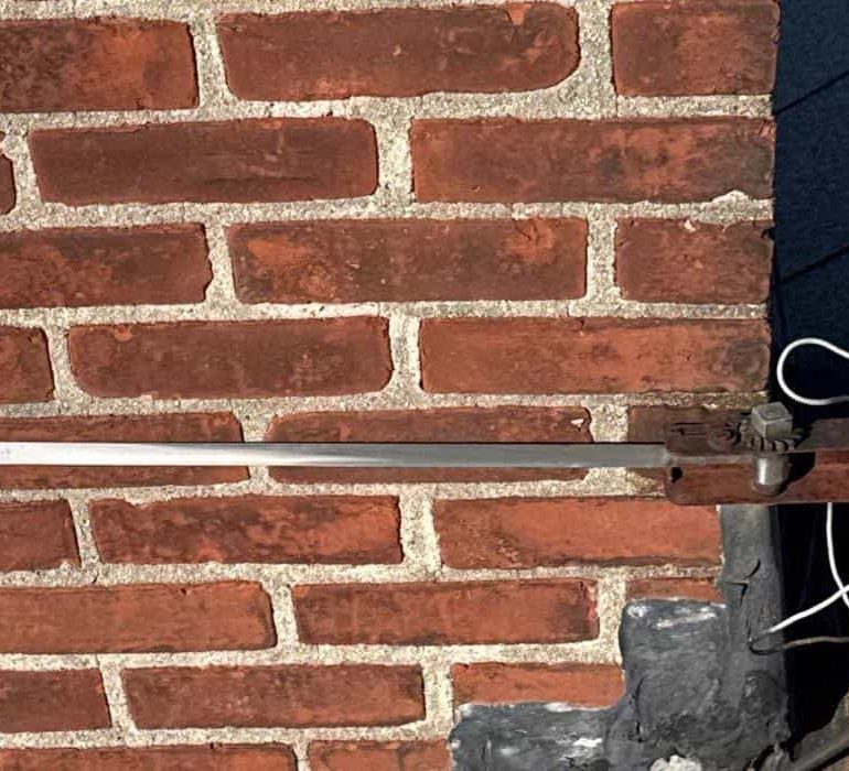 commercial roof inspection guide protect investment Commercial roof inspection focusing on chimney flashing, shingle condition, and structural roof integrity assessment