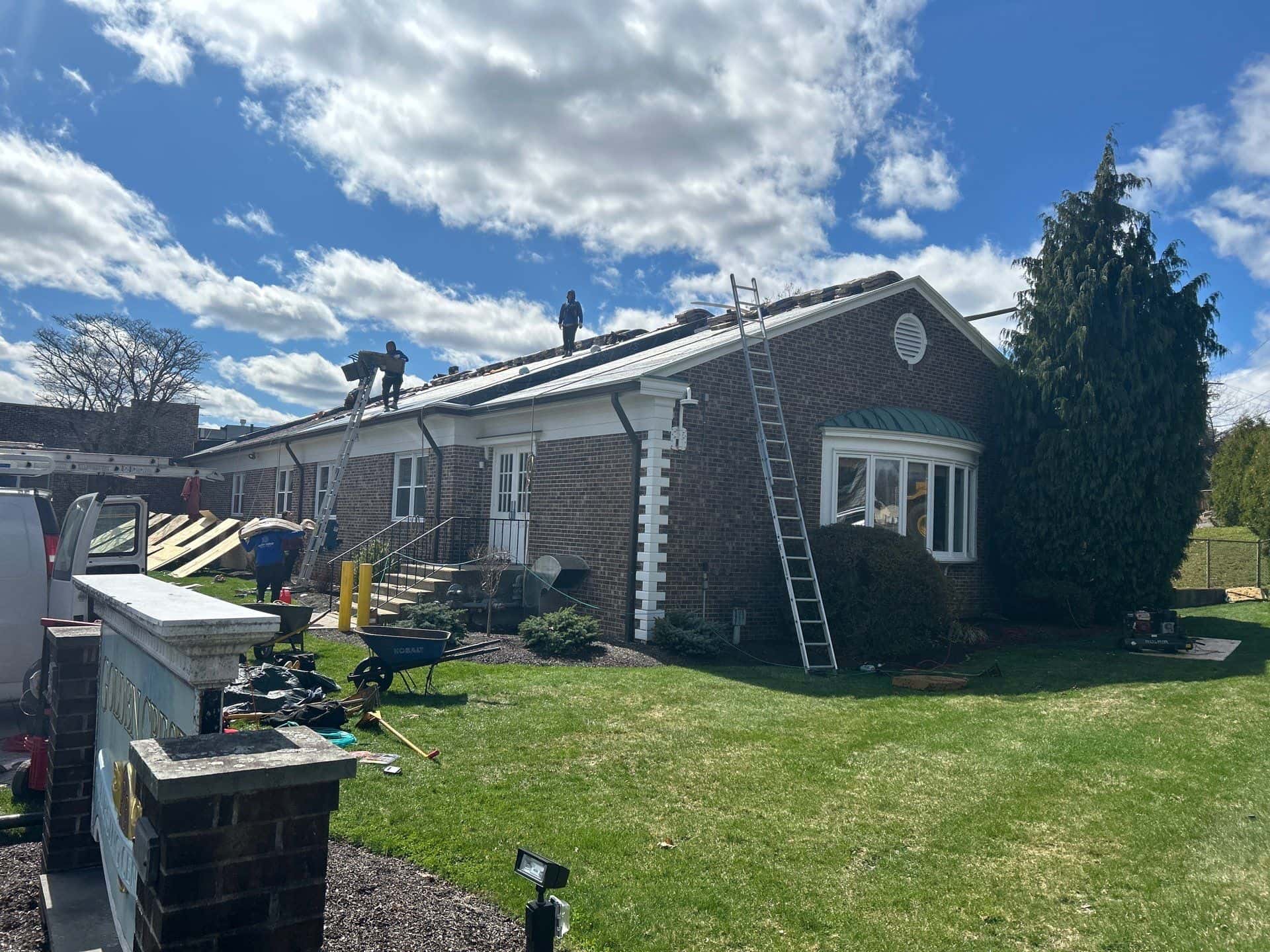 Professional roof maintenance and seasonal inspection on a residential home to prevent damage and extend roof lifespan